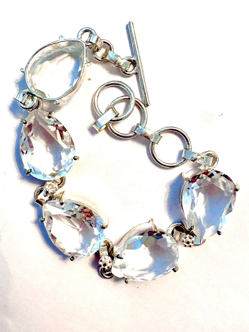 5 sparkly, vibrant, 925  marked, White Topaz,, will  fit size, 7-7 1/2 - 8.